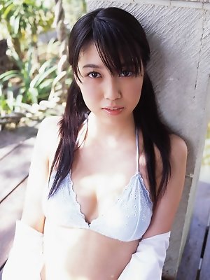 Beautiful gravure angel melts the scene in her bikini at a beach