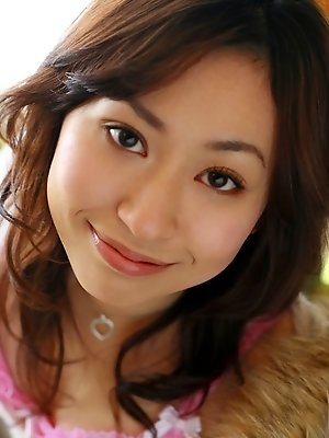 Asian teen model has a nice round ass and hot tits to go with it